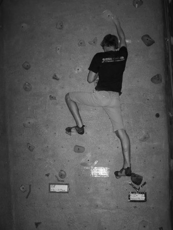 Nidalmia ascends the wall at The Rogue Rock Gym.